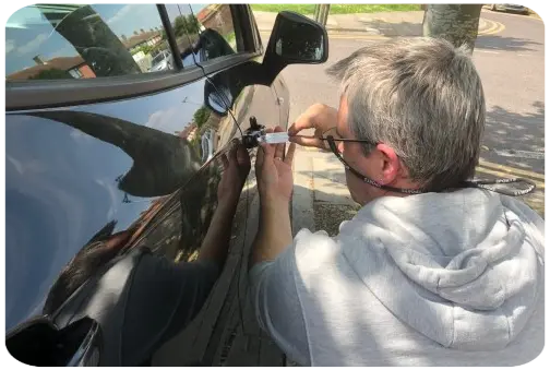 Locksmith Picking Car Lock